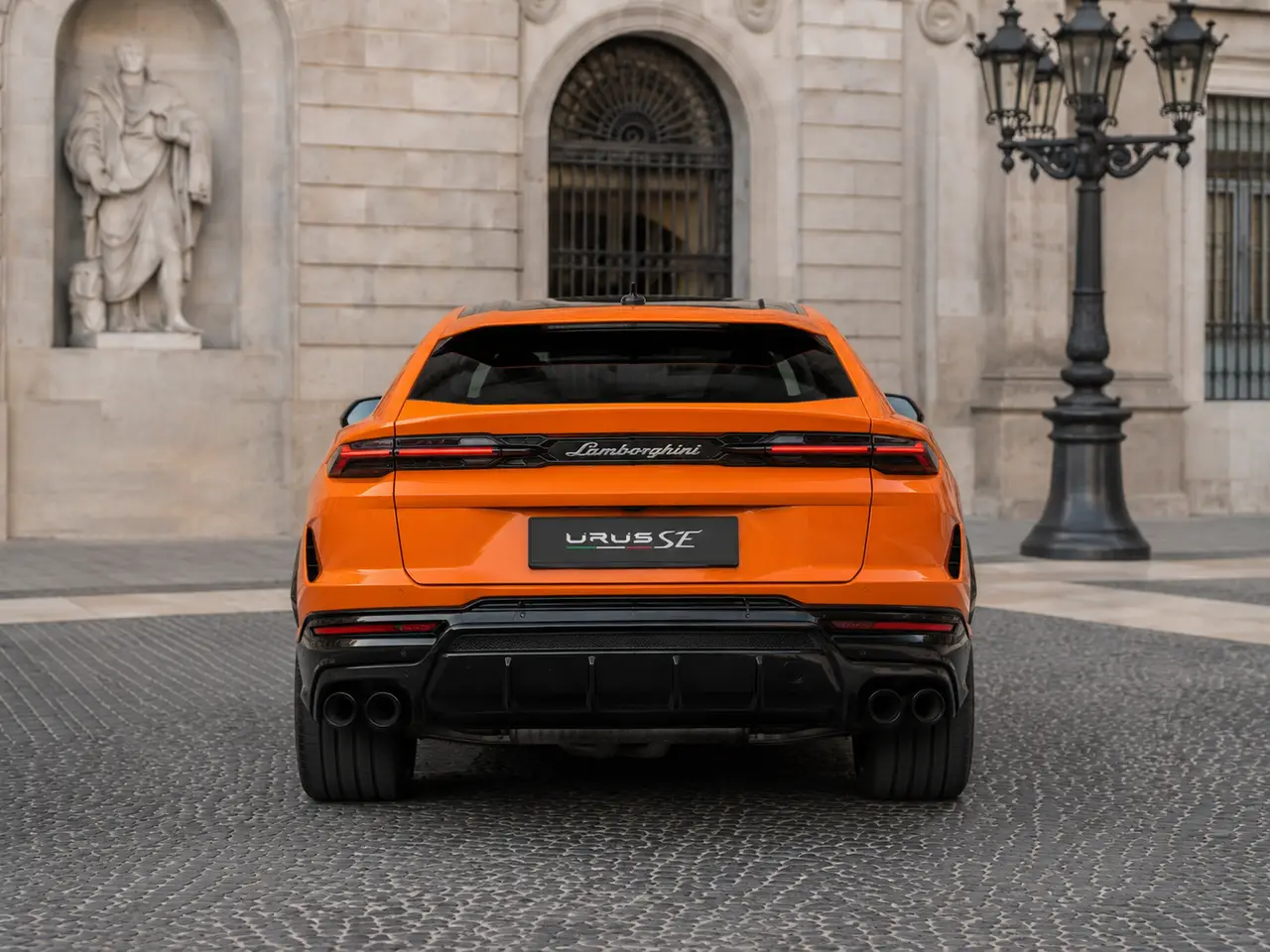 Lamborghini URUS SE 2025, rear view — Munich Luxury Cars, Munich. The 2025 Lamborghini Urus SE brings Lamborghini's SUV into a five-seat package built for…