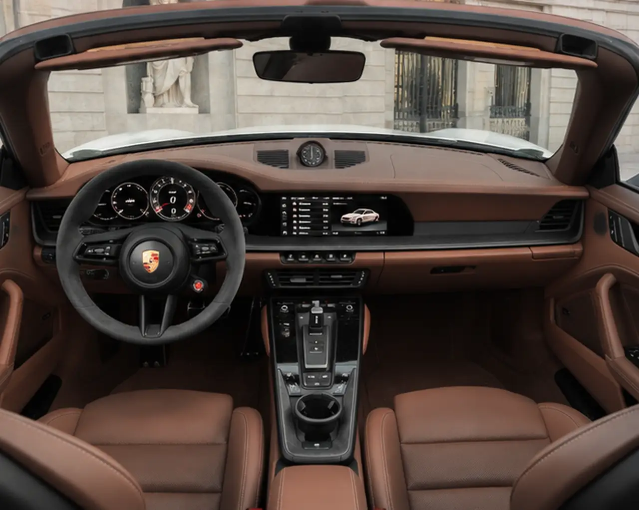 Porsche 992.2 Carrera 4 GTS Cabrio 2025, interior — Munich Luxury Cars, Munich. The 992.2 Carrera 4 GTS Cabrio pairs a 540 hp flat-six with all-wheel drive, giving it a…
